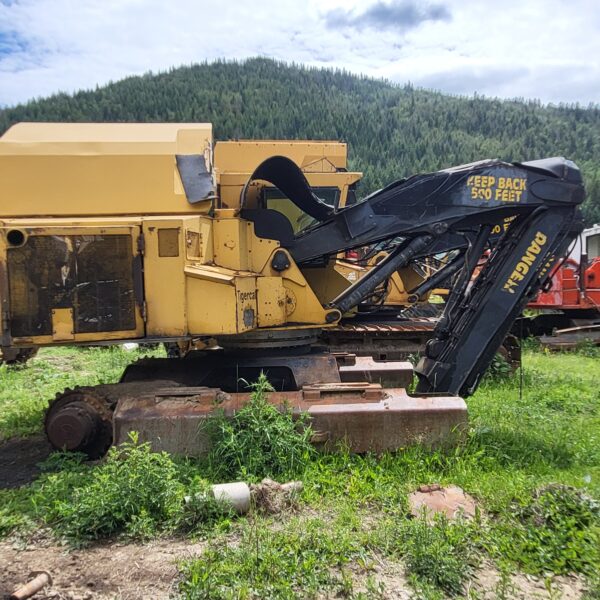 Tigercat 853 Excavator